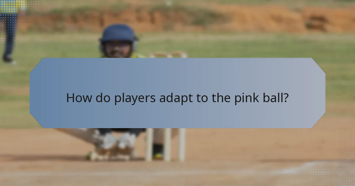 How do players adapt to the pink ball?